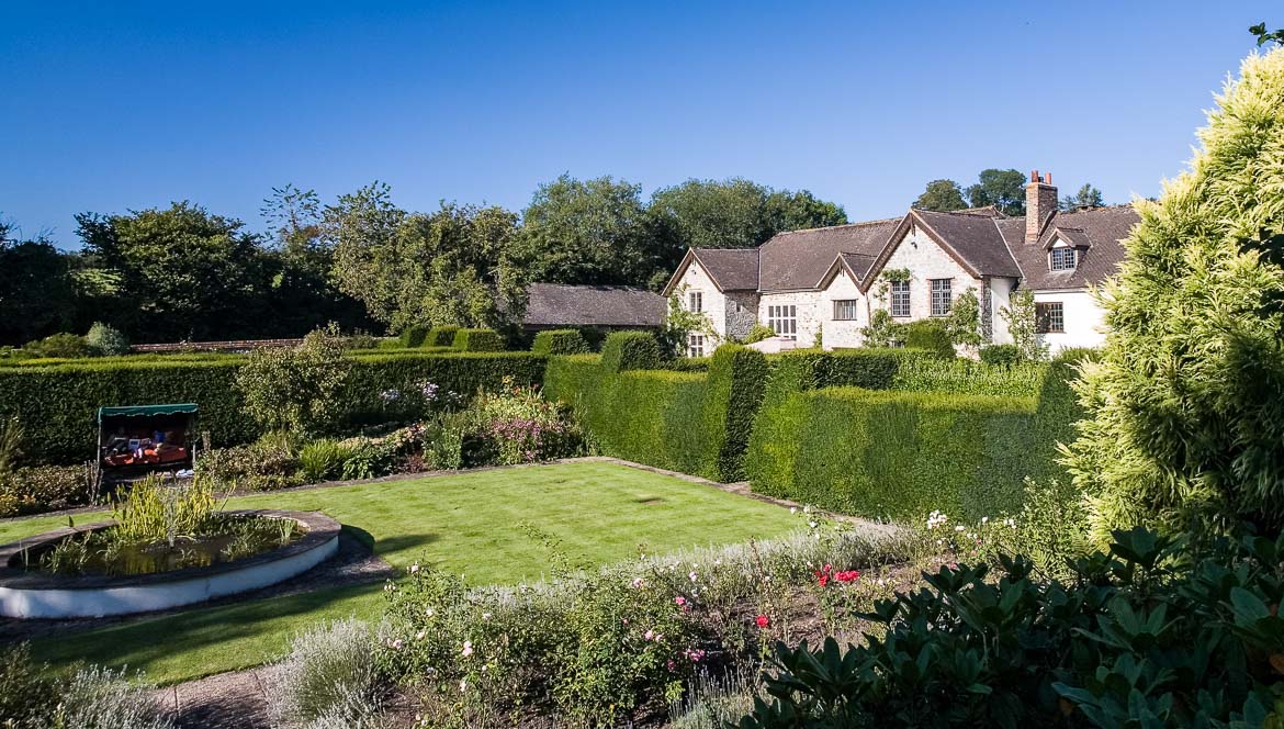 Knightstone Manor from the Rose Garden (in August just before the hedges are cut). Knightstone was built in 1380.