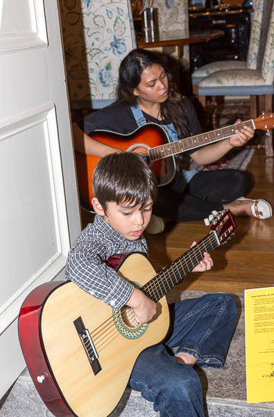 Eric training on his guitar with the help of Riza. Oct 2014