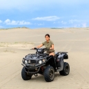 Jen driving a quad bike