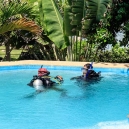 The pool is very deep and built specially to teach scuba diving