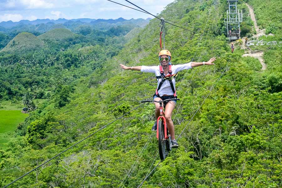 Cycling in the sky. Mikee is behind Jennifer. Jennifer says it was really scary