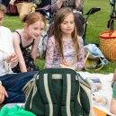 Guests during the picnic in the wild flower meadow