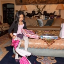 Mikee opening her presents after the party