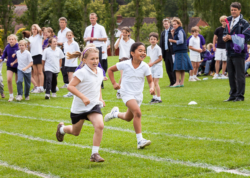 Jessie and Mikee sprinting at St John’s sports day