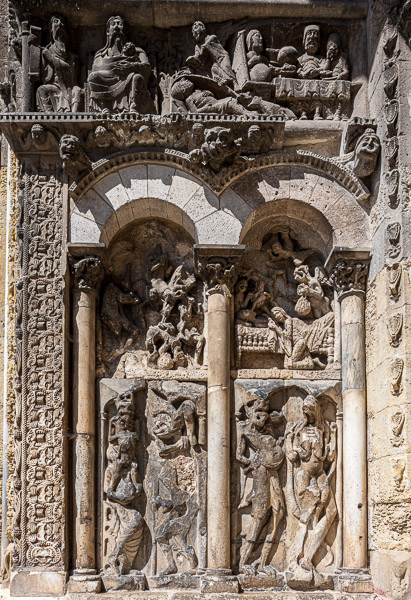 The carvings beside the entrance door to the church are from the same period