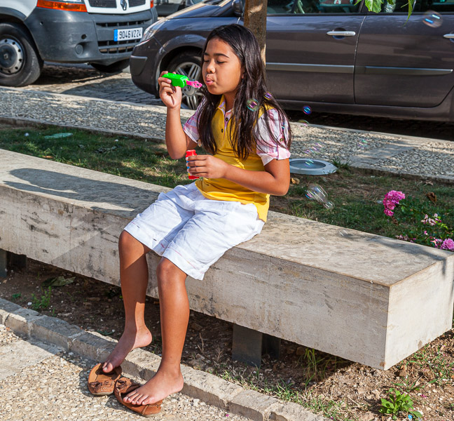 Mikee blowing bubbles