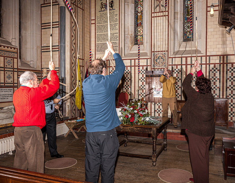 The ringers at a Church service a week before Christmas