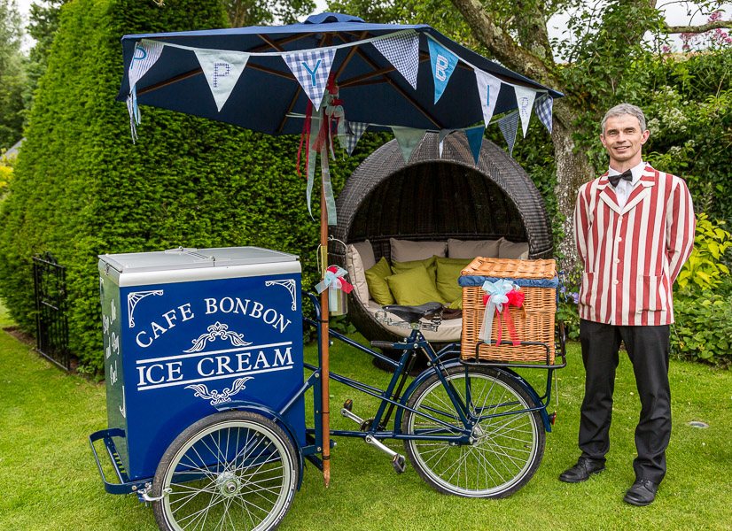 The Ice Cream Man with his bicycle set up in the garden