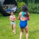 …while Mikee and Eric are attacking each other with water guns