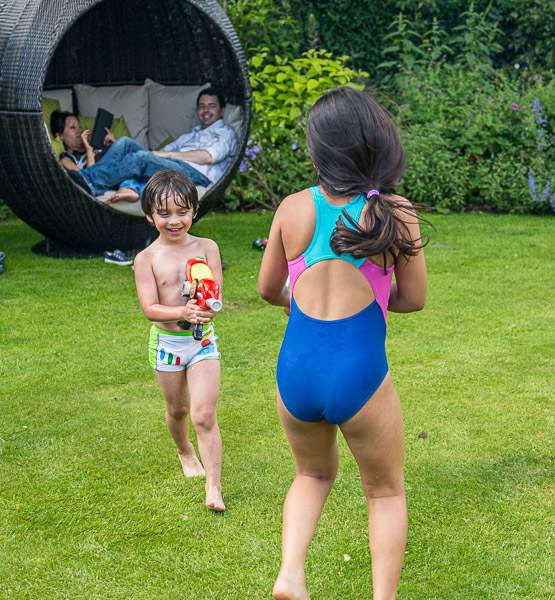 …while Mikee and Eric are attacking each other with water guns