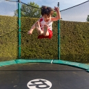Jumping on the trampoline