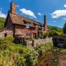 another view of the same cottage and bridge