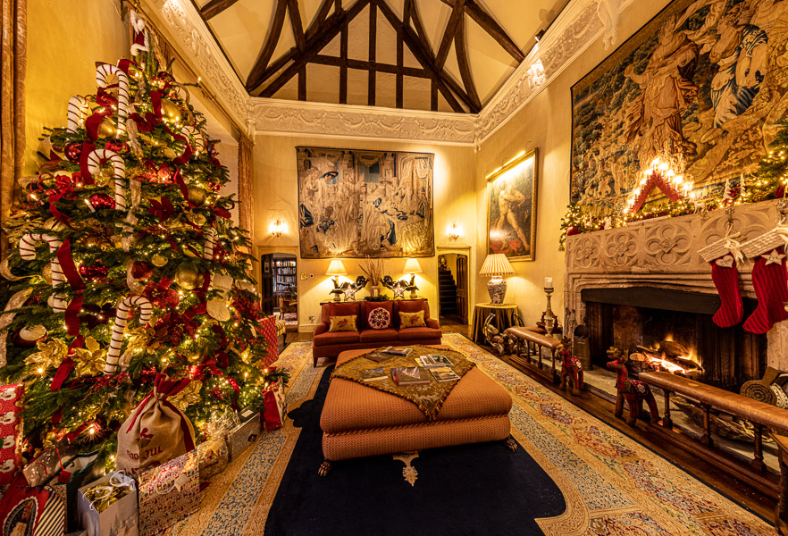 The Great Hall with a Christmas Tree only half the size of our normal ones.