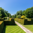 Walking up the entrance between the yew hedges protecting the formal gardens.