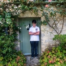 And a not entirely happy Eric posing in the same doorway