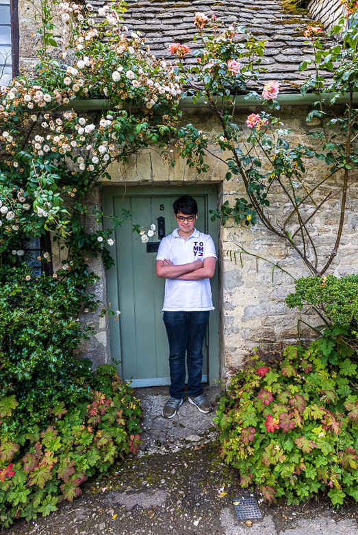 And a not entirely happy Eric posing in the same doorway