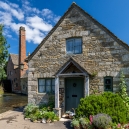 Another little cottage with the watermill in the background